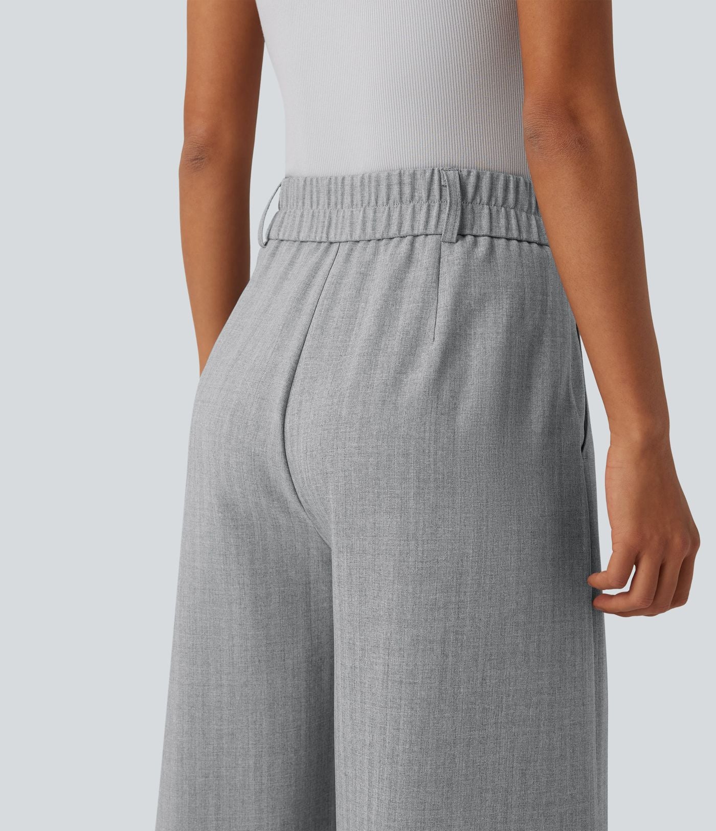 Pantalon tailleur 7/8 large plissé taille haute aspect lin avec poches