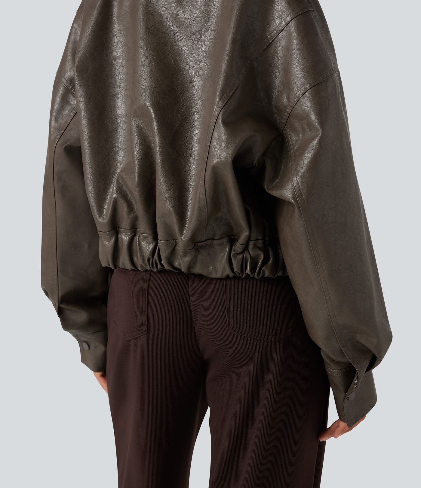 Veste décontractée en tissu enduit à fermeture éclair et manches longues avec poches
