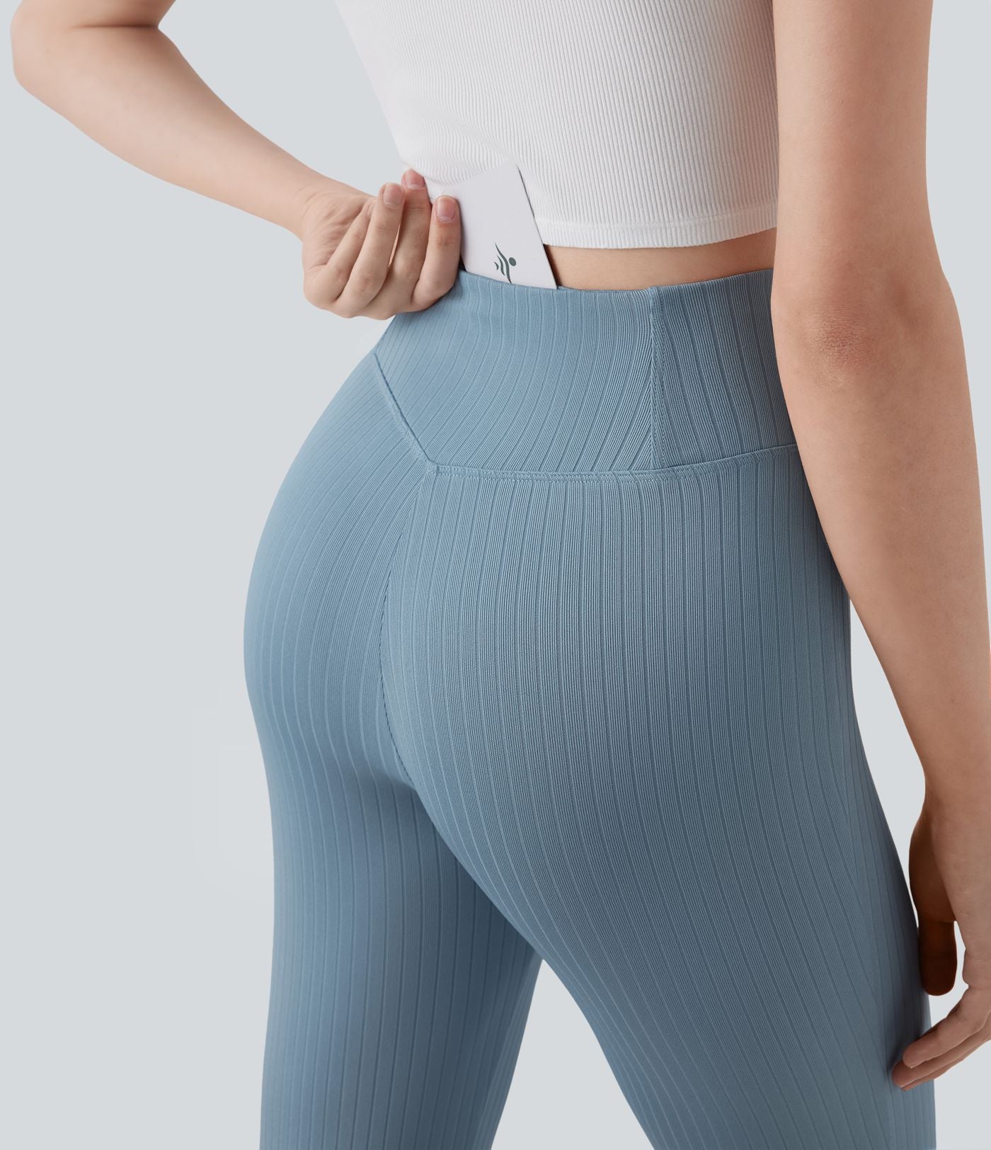 Pantalon large fluide côtelé à taille haute croisée avec poche arrière