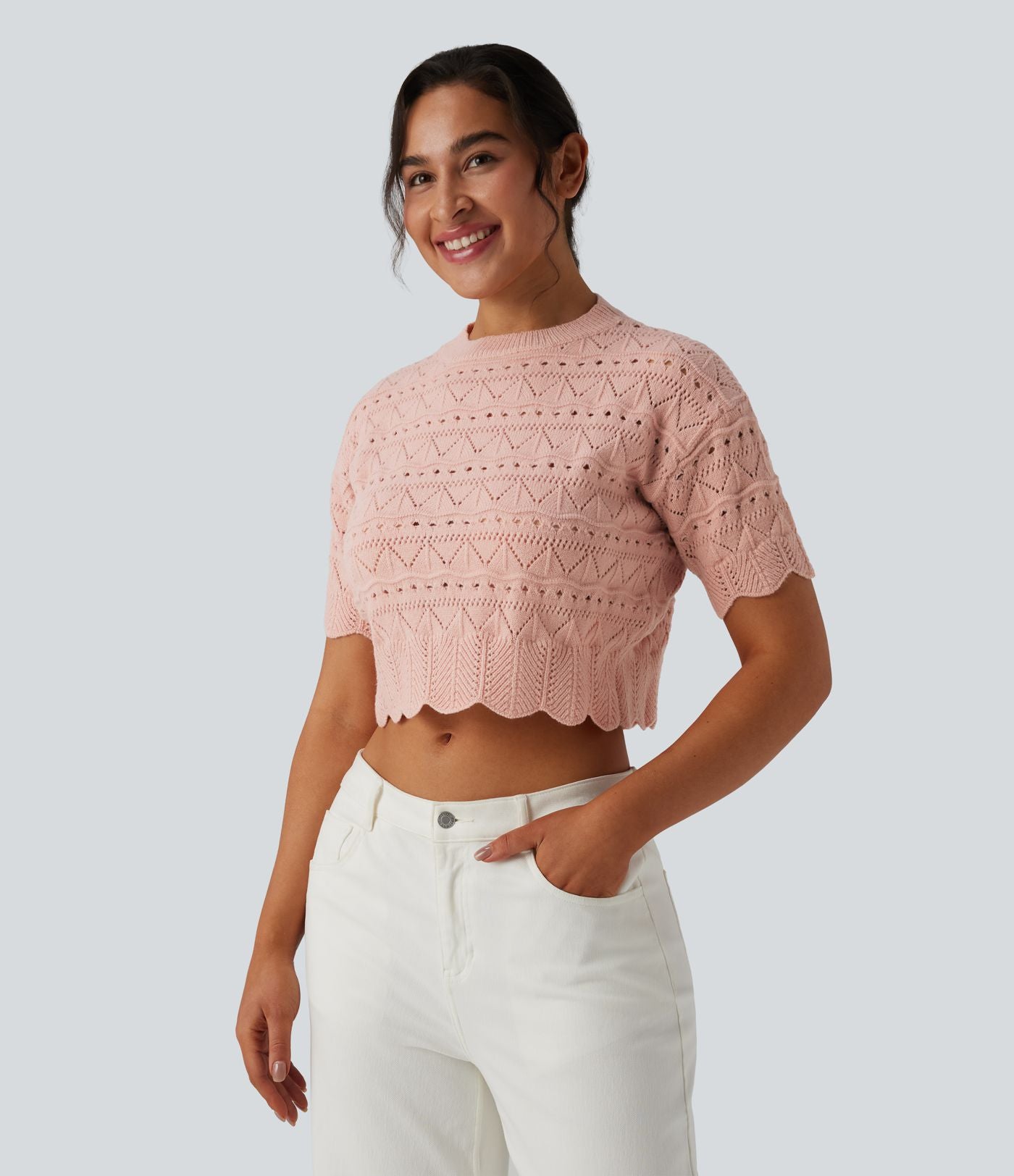 Pull décontracté en maille ajourée à col rond, manches courtes et bordure festonnée