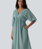 Robe midi casual col V à manches trois-quarts aspect lin, avec poches