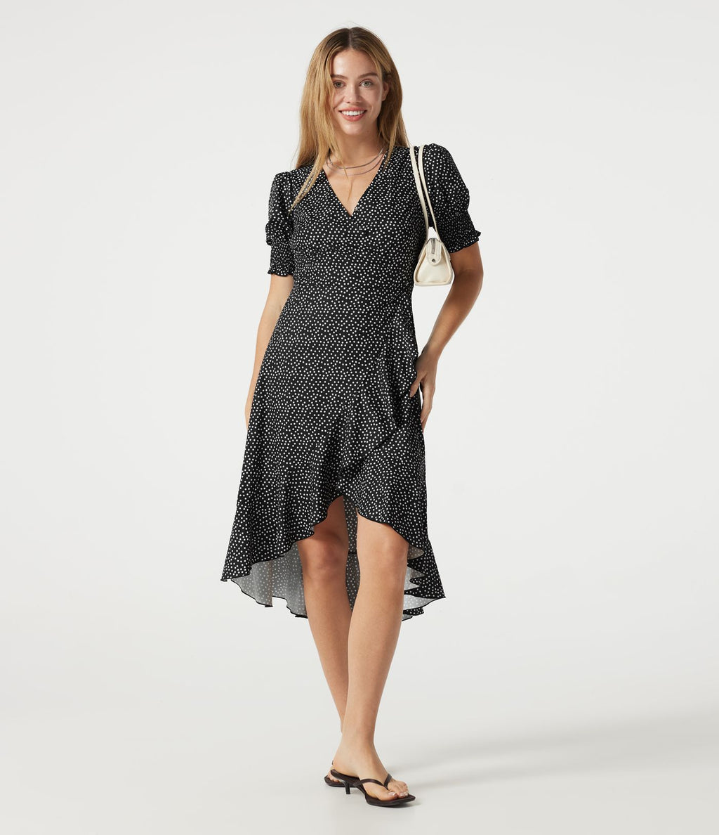 Robe casual midi col V à manches courtes à pois avec ourlet à volants