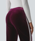 Pantalon évasé en velours taille basse color block à rayures avec poches