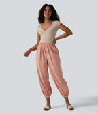 Pantalon décontracté coupe ballon taille haute aspect lin avec poches
