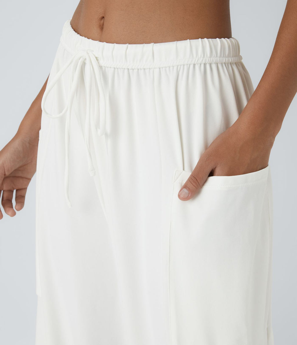 Pantalon Large Fluide Taille Mi-Haute Taille Élastique Cordon Poches Latérales Ourlet Flottant