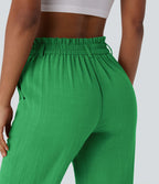 Pantalon capri effet lin taille haute avec poches zippées