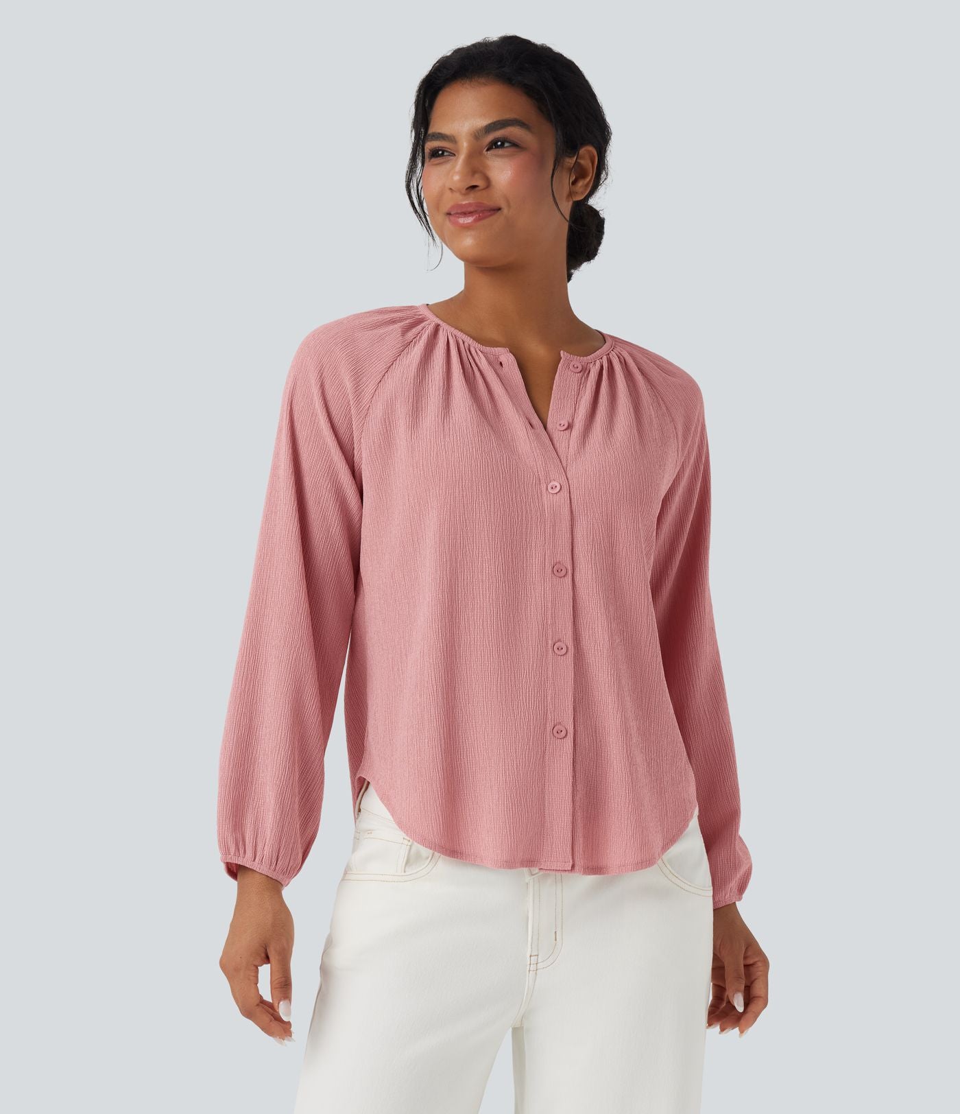 Blouse texturée col rond manches longues ourlet arrondi