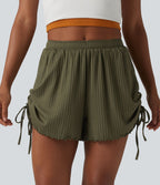 Short en maille côtelée taille mi-haute à cordon de serrage et ourlet ondulé 10 cm avec poches
