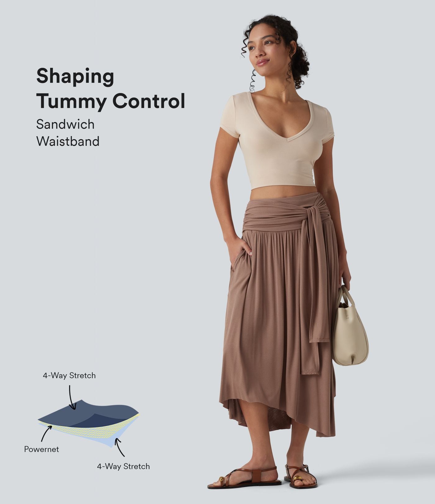 Jupe midi fluide casual gainante côtelée taille haute à nœuds latéraux et ourlet asymétrique avec poches