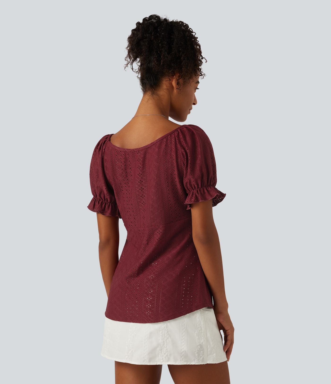 Blouse décontractée col V manches courtes bouffantes lacée ajourée