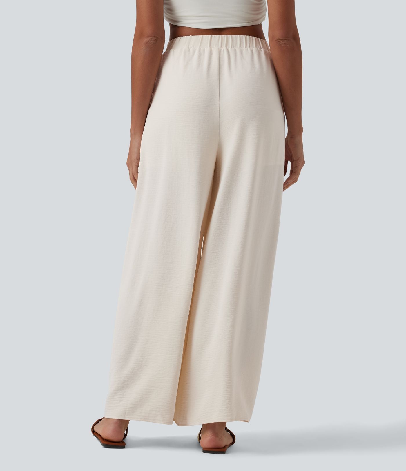 Pantalon large resort taille haute aspect lin avec nœud frontal et poches - Short intégré