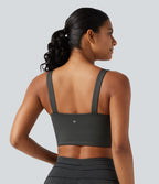 Brassière de sport push-up rayée à maintien léger, avec coussinets fixes, idéale pour le yoga.
