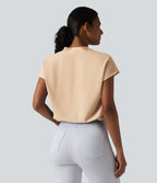 Blouse esprit bureau ample défroissage facile, col V et manches chauve-souris