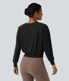 Top yoga sport oversize col V Cool Touch séchage rapide