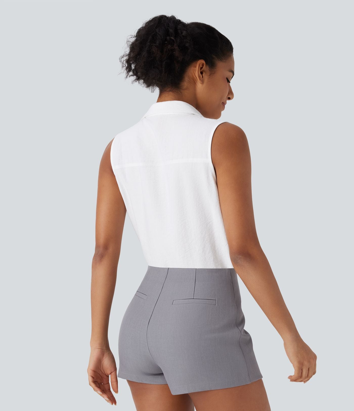 Chemise de travail sans manches à col V et boutons