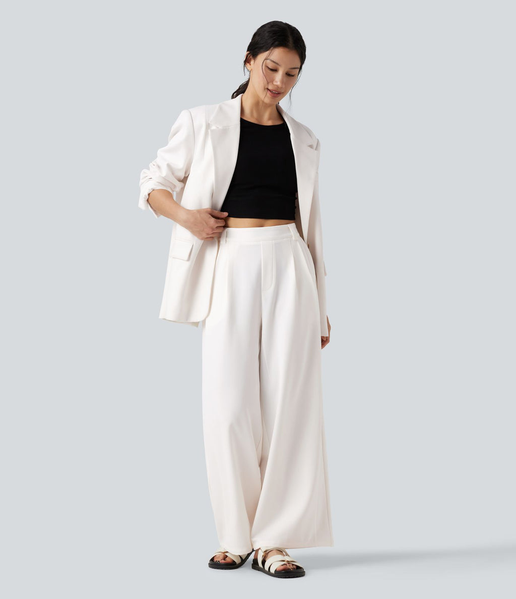 Pantalon tailleur large, taille moyenne, à poches