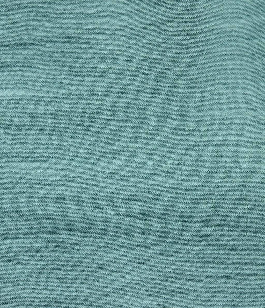 Short resort large aspect lin taille haute froncée avec nœud frontal, ourlet volanté et poches