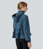 Veste cape d'entraînement à capuche amovible avec cordon de serrage, mesh contrastant et ourlet à volants avec poche