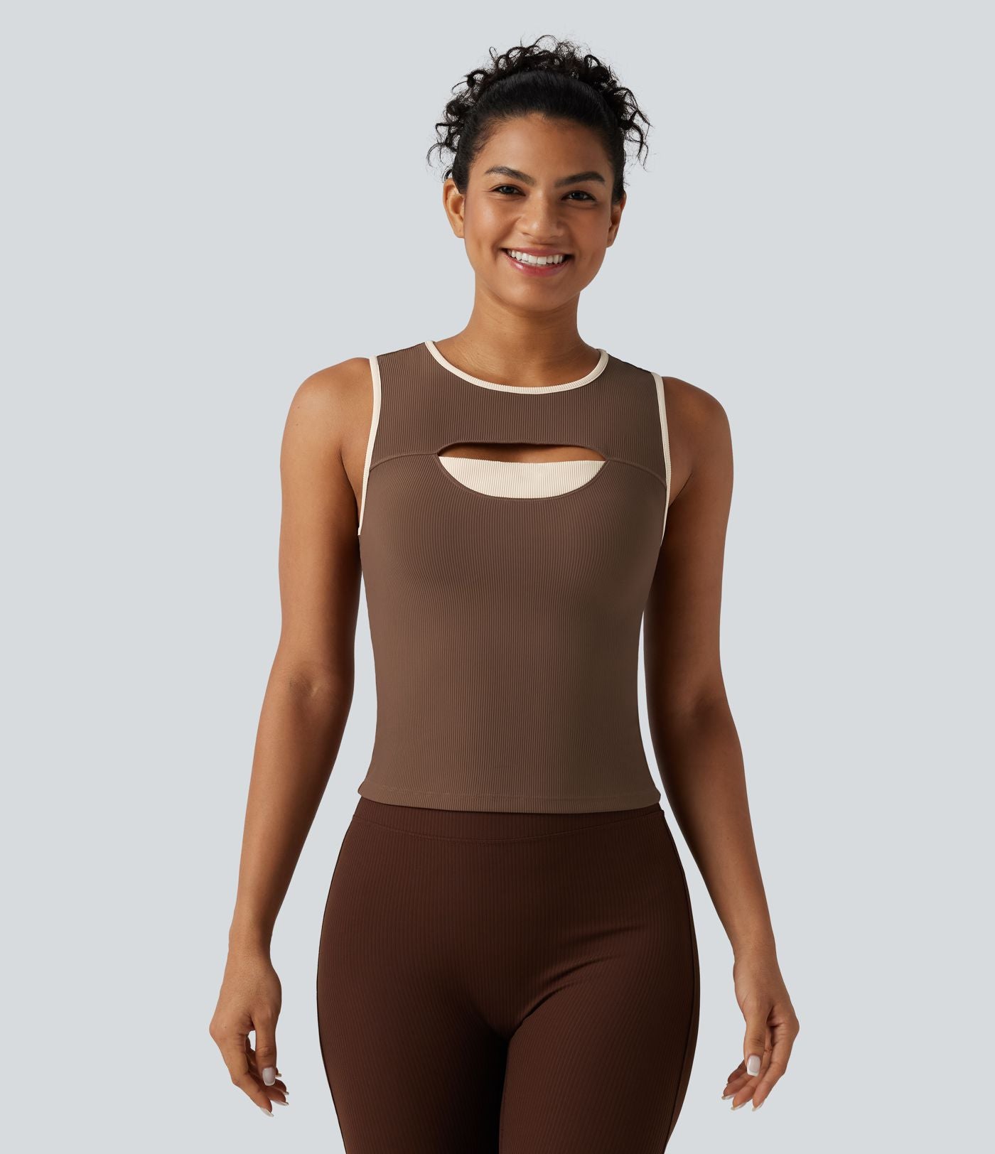Débardeur de sport côtelé col rond color block avec découpe à l'avant