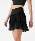 Jupe-short tennis mini fluide taille haute croisée en mesh à volants, avec poches