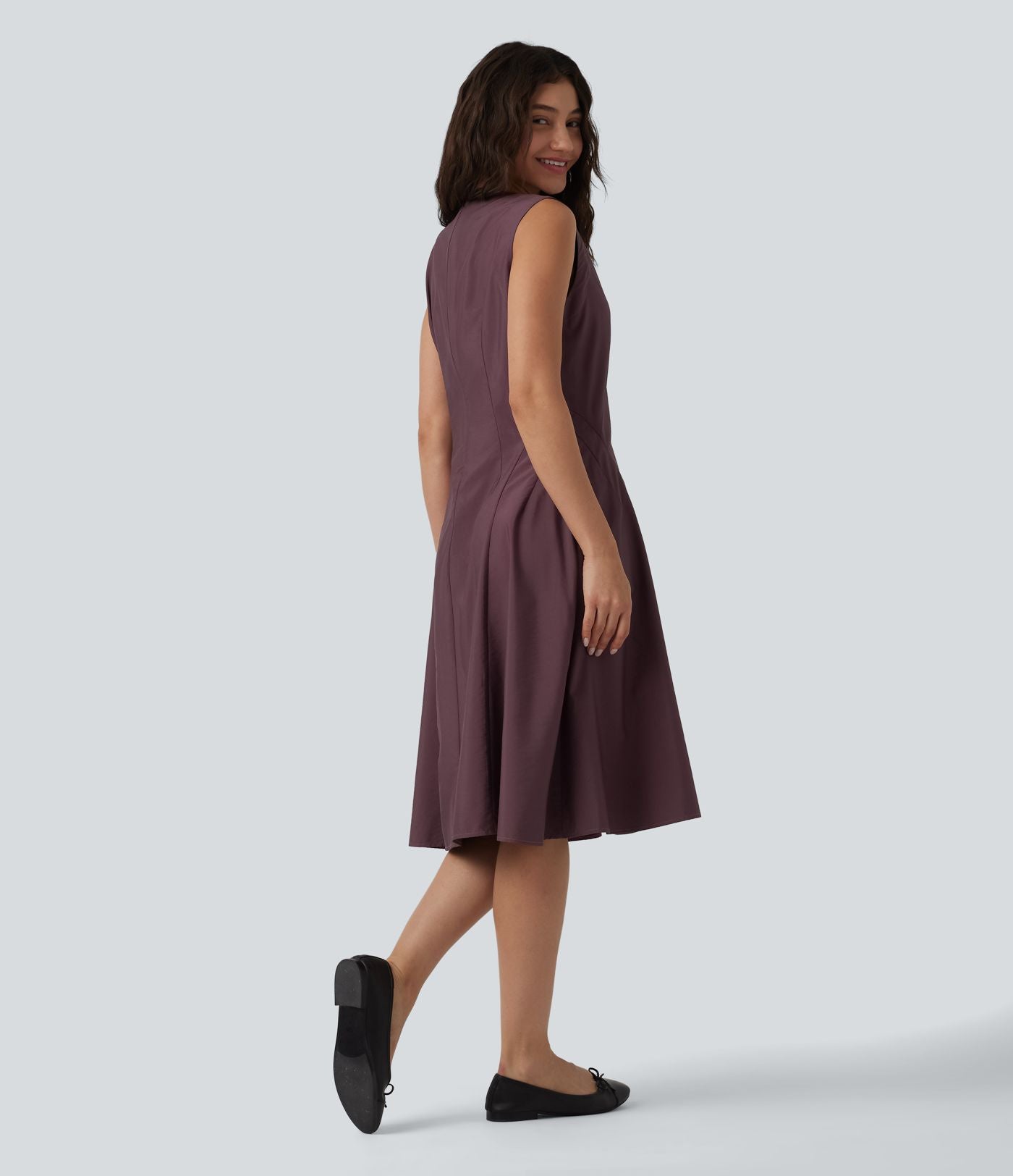 Robe mi-longue évasée de travail col cranté sans manches avec poches