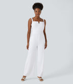 Combinaison SoftlyZero™ Airy invitée de mariage et demoiselle d'honneur dos nu avec nœud au dos, poches latérales effet frais InstantCool