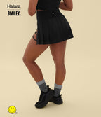 Jupe mini de danse plissée 2-en-1 Halara X Smiley® Breezeful™ taille haute à ourlet asymétrique séchage rapide avec poches