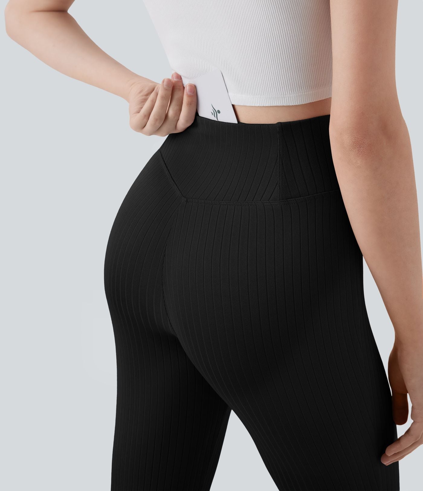 Pantalon large fluide côtelé à taille haute croisée avec poche arrière