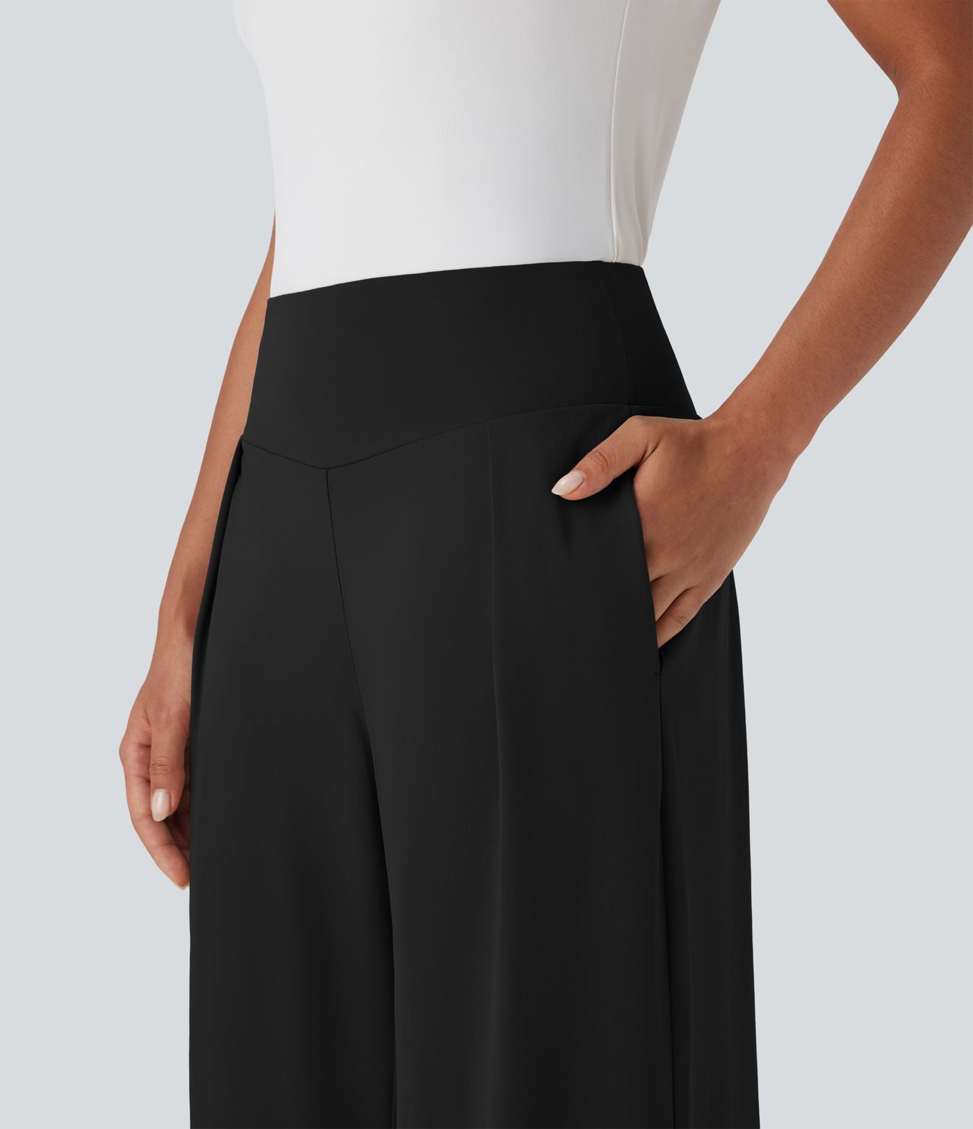 Pantalon large fluide taille haute avec poches latérales