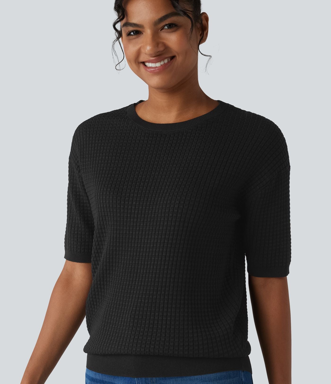 Pull col rond manches courtes en tissu gaufré