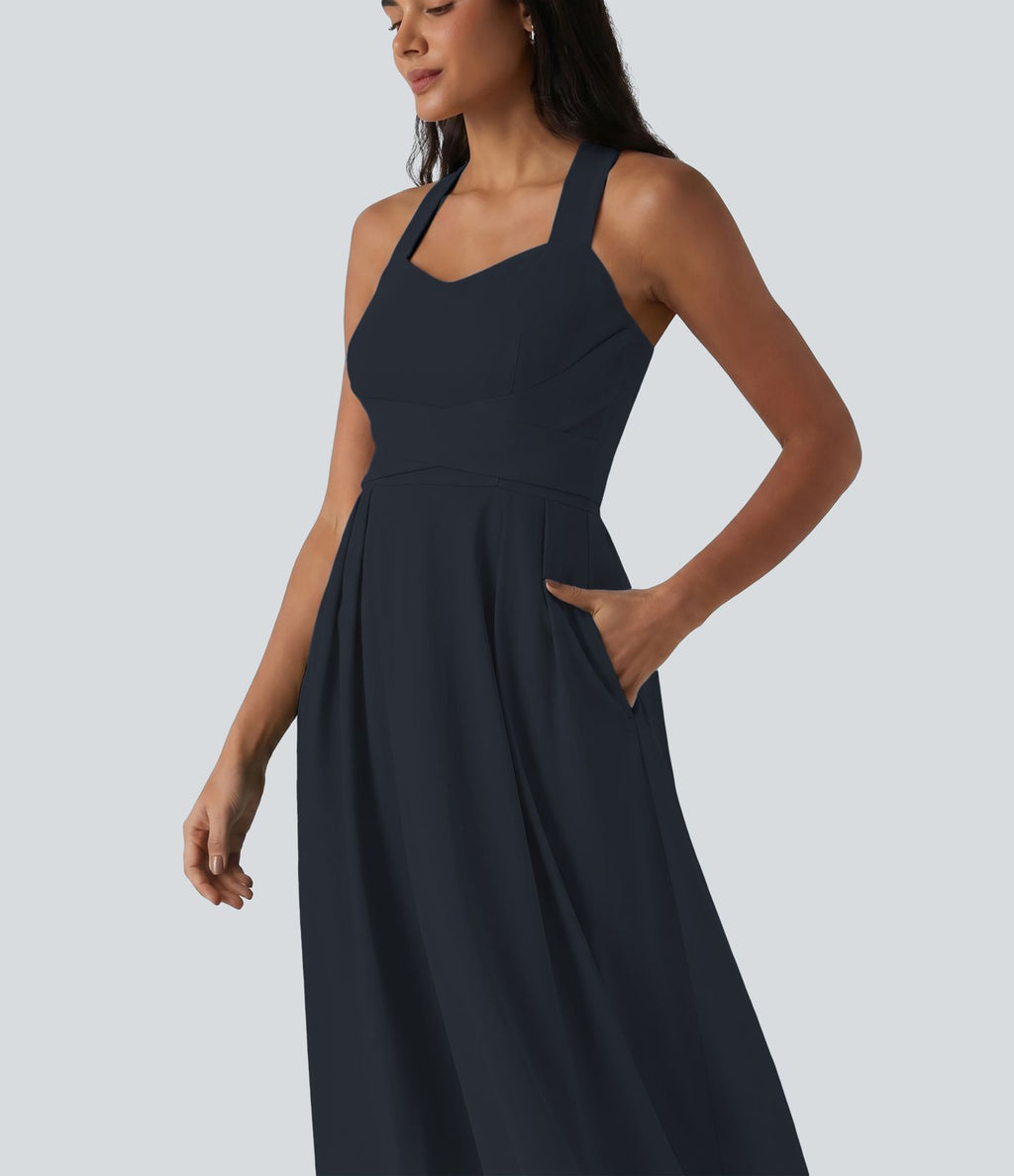 Robe midi fluide sans manches décolleté cœur avec bretelles croisées, nœud dans le dos et poches