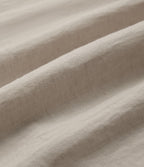 Chemise décontractée à manches courtes avec col et ourlet arrondi, aspect lin