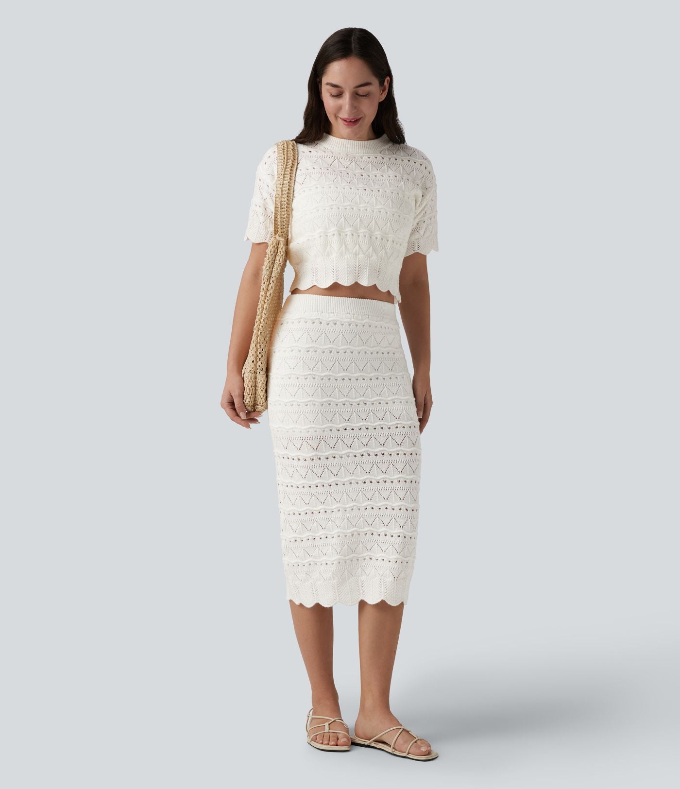 Jupe mi-longue maille ajourée 2-en-1 taille haute avec poches