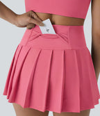 Jupe-short de danse mini Breezeful™ à taille haute, plissée, 2-en-1, avec poches latérales et arrière, ourlet asymétrique et séchage rapide