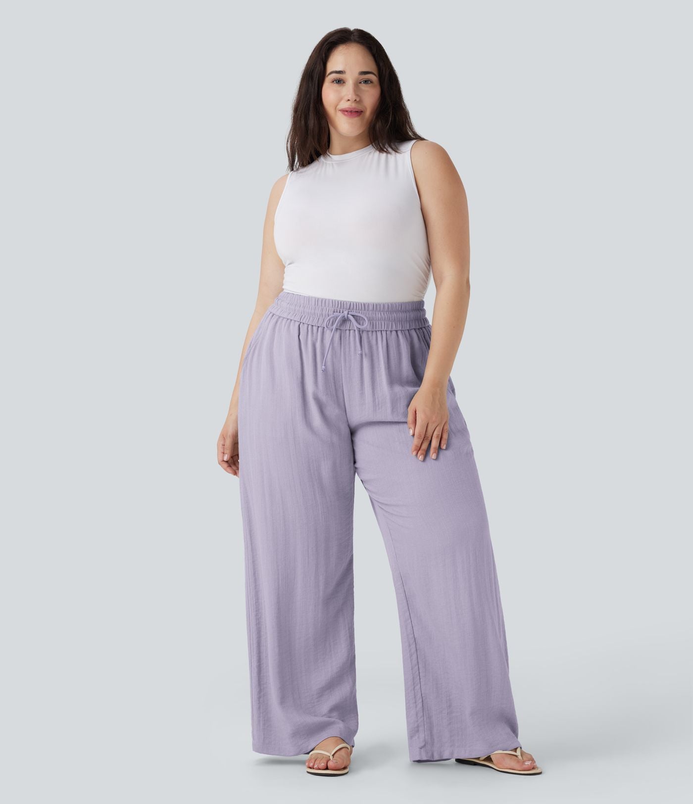 Pantalon décontracté grande taille large fluide taille haute effet lin avec cordon de serrage et poches