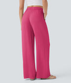 Pantalon large fluide taille haute avec cordon de serrage, poches latérales et aspect lin