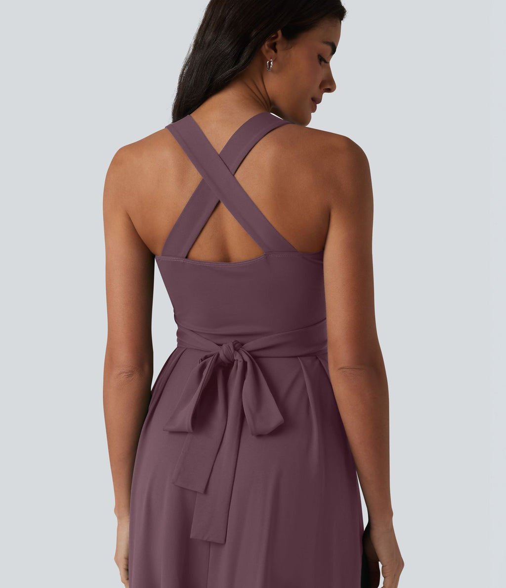 Robe midi fluide sans manches décolleté cœur avec bretelles croisées, nœud dans le dos et poches