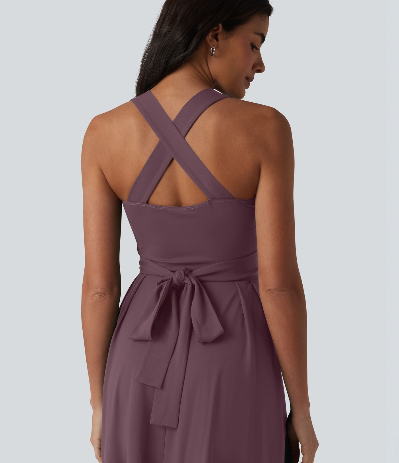 Robe midi fluide sans manches décolleté cœur avec bretelles croisées, nœud dans le dos et poches