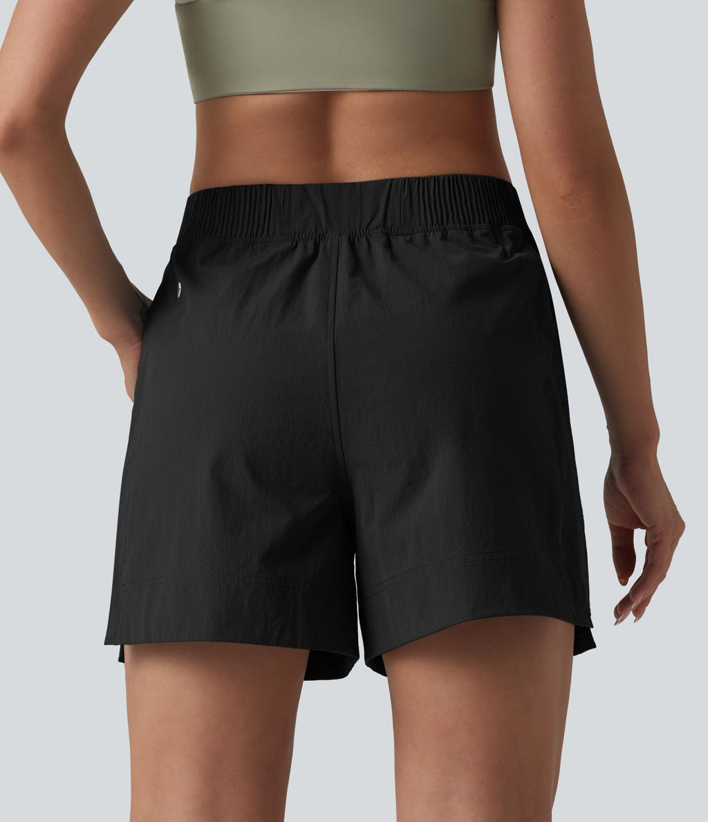 Short de tennis taille haute effet frais InstantCool avec fentes et poches, protection solaire UPF50+