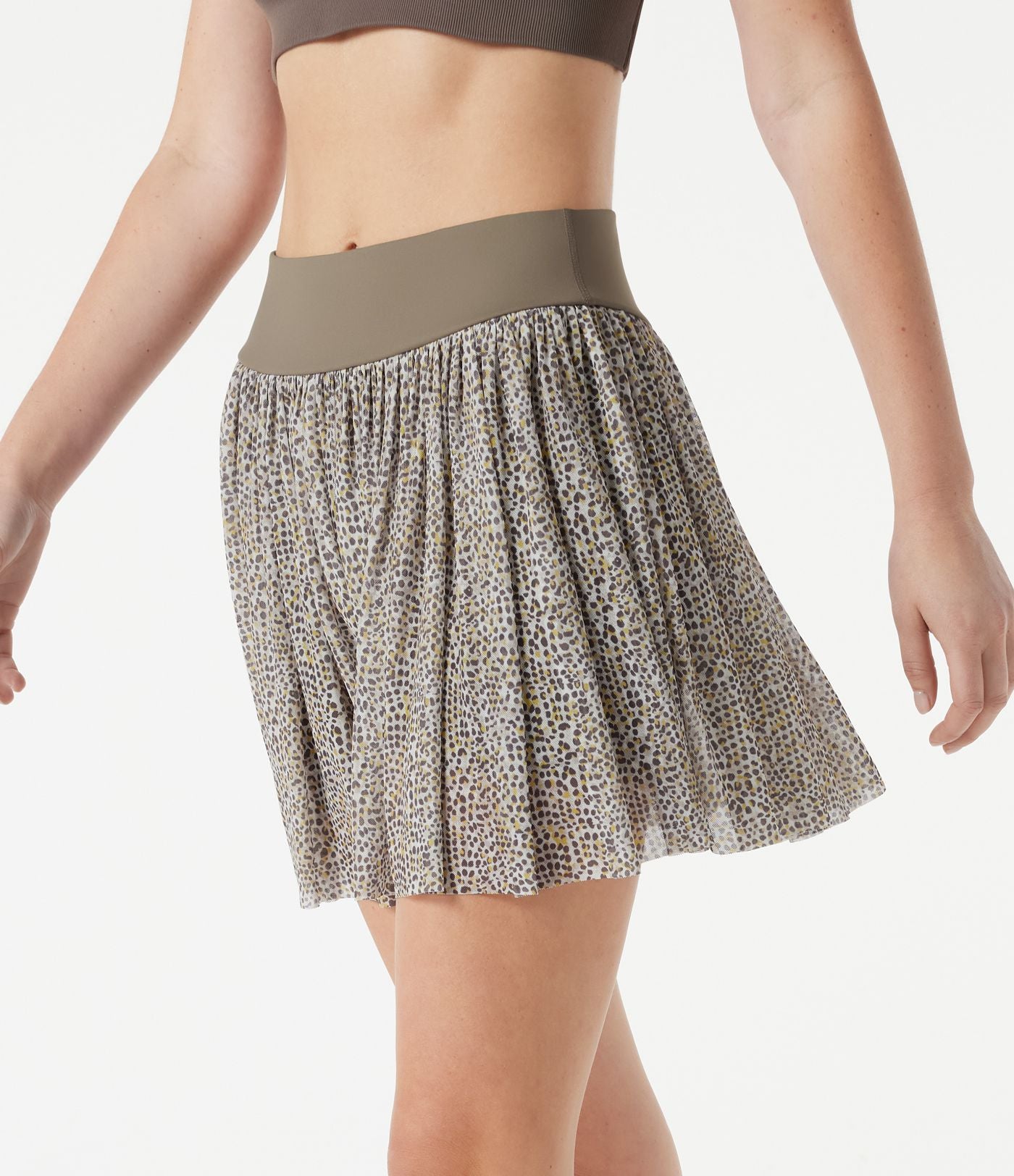 Jupe de sport mini 2-en-1 fluide taille mi-haute en mesh léopard avec poche