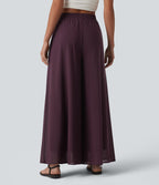 Pantalon fluide et ample avec superposition en mesh, poches latérales et taille haute