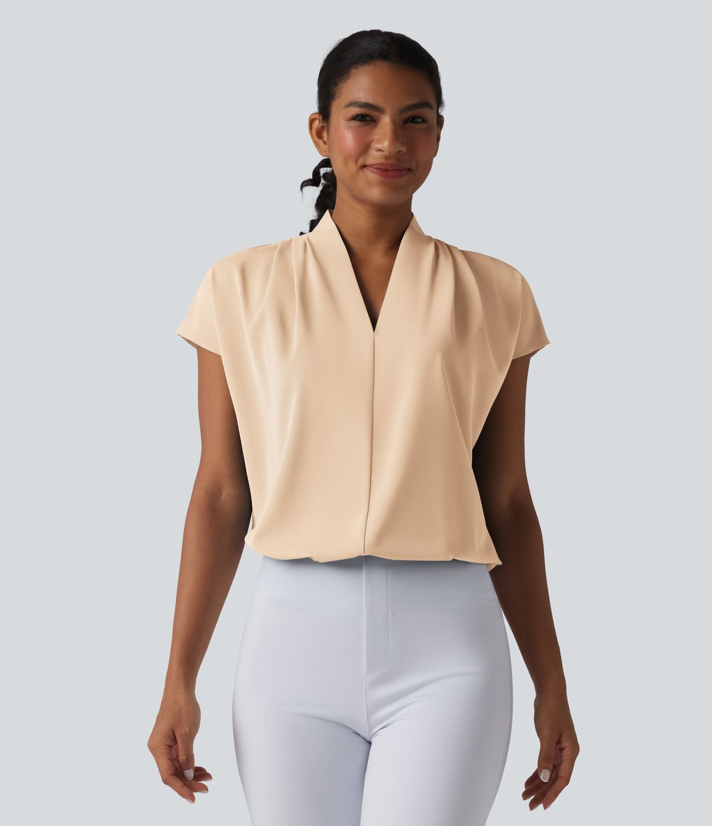 Blouse esprit bureau ample défroissage facile, col V et manches chauve-souris