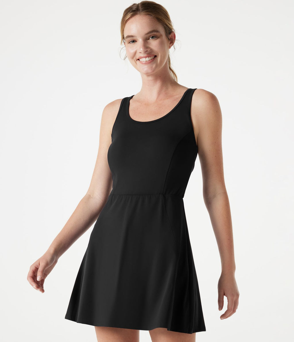Robe sport de tennis mini SoftlyZero™ sans manches avec dentelle contrastée torsadée, brassière intégrée et poches - Easy Peasy - UPF50+