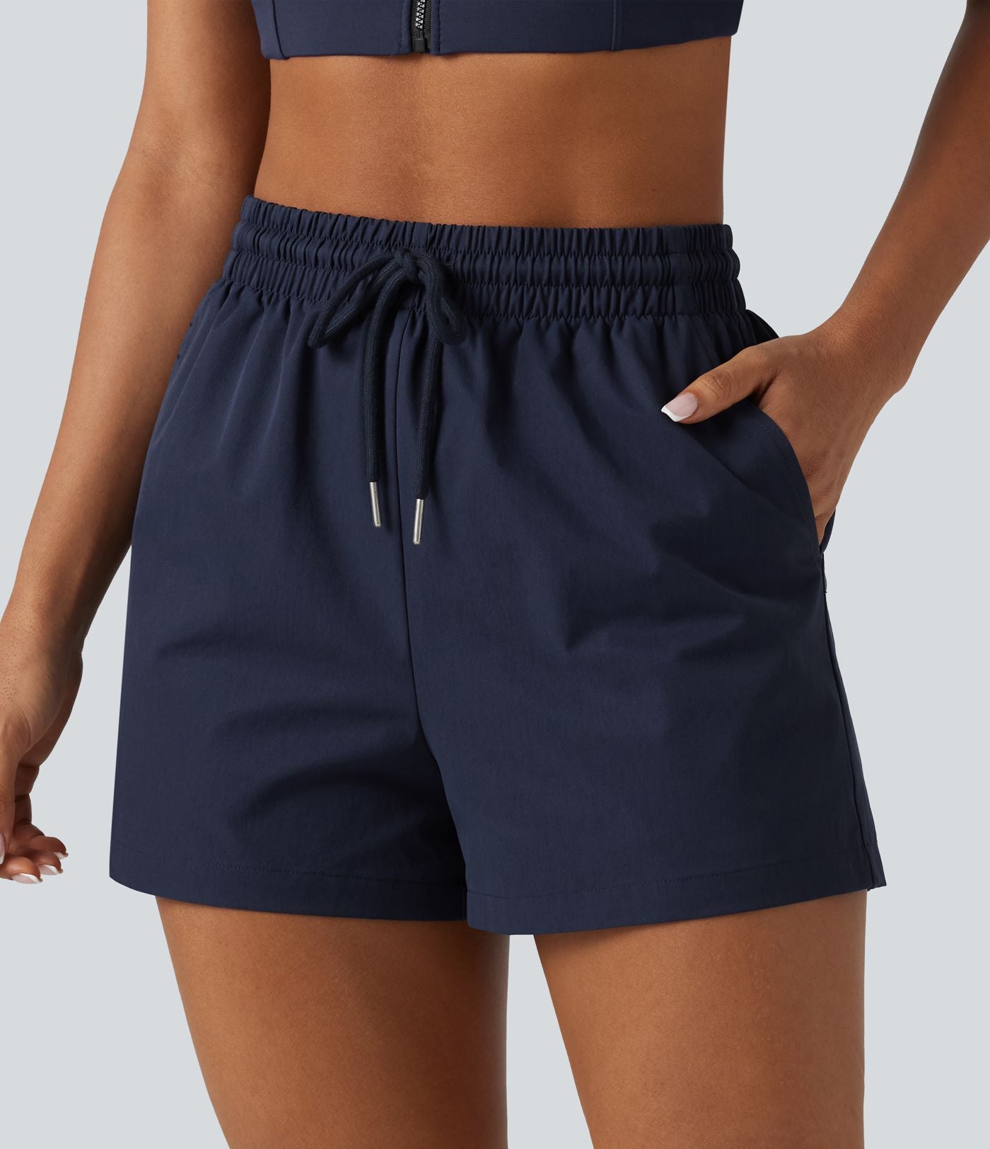 Short de sport baggy taille haute extensible en popeline avec cordon de serrage et poches