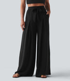 Pantalon large resort taille haute aspect lin avec nœud frontal et poches