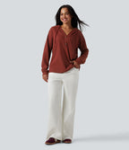 Top gaufré à capuche col Henley manches longues