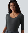 Top tailleur en mélange de laine col rond échancré à manches courtes en maille côtelée