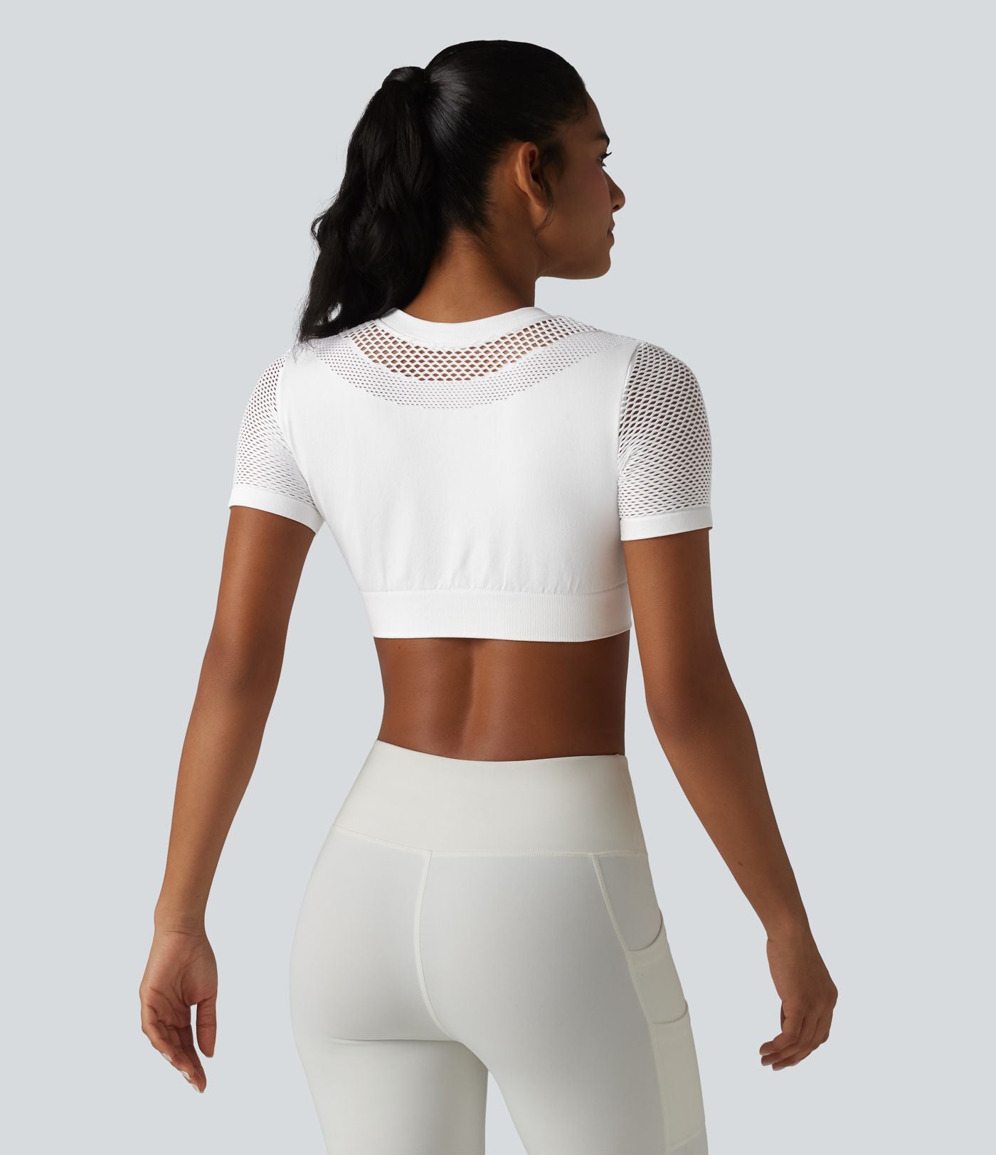 OneForm Seamless Flow Haut de sport crop col rond manches courtes avec découpes