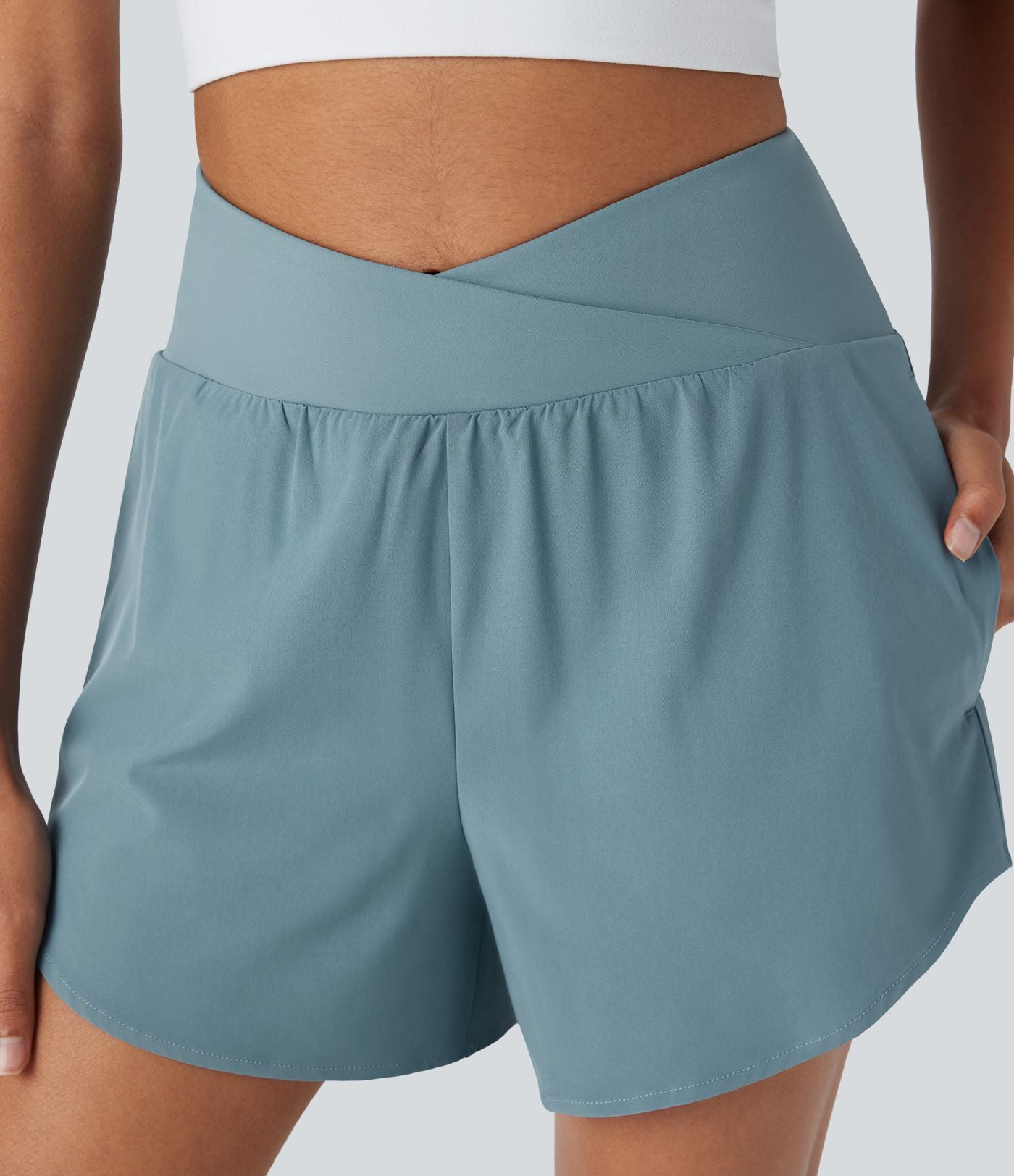Short yoga 2-en-1 Breezeful™ taille haute croisé séchage rapide avec poches multiples