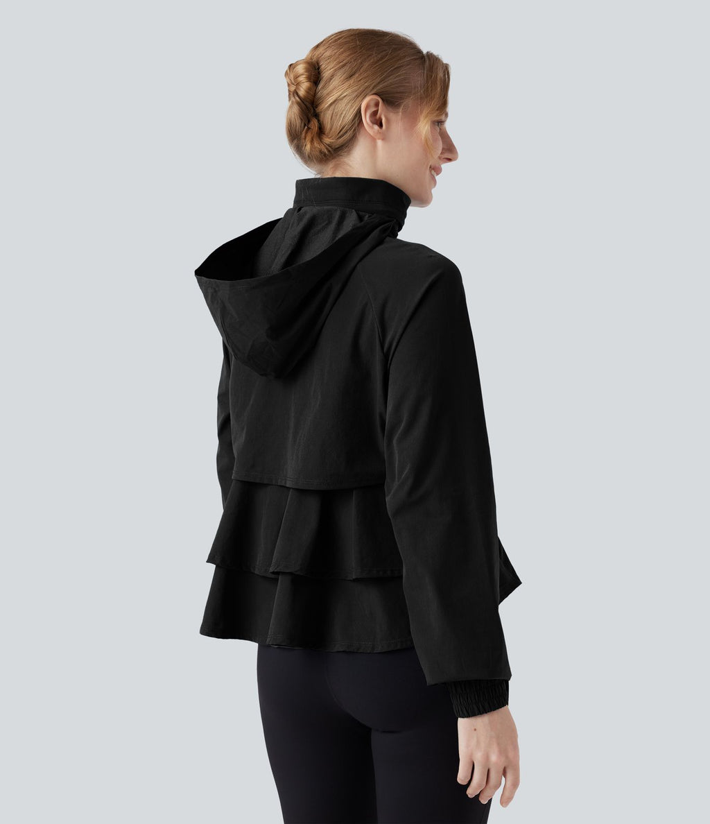 Veste cape d'entraînement à capuche amovible avec cordon de serrage, mesh contrastant et ourlet à volants avec poche